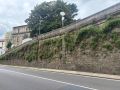 El aspecto actual del muro de la Plaza de Abastos