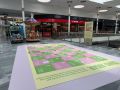 As Cancelas estrena “Abajo el Dado”, un juego de mesa gigante para toda la familia El juego ya colocado en el suelo del centro comercial