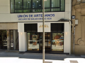 La Unión de Artesanos de Galicia denuncia la apertura de un expediente municipal y la orden de suspensión de su actividad en unas oficinas de la rúa Xeneral Pardiñas de Santiago